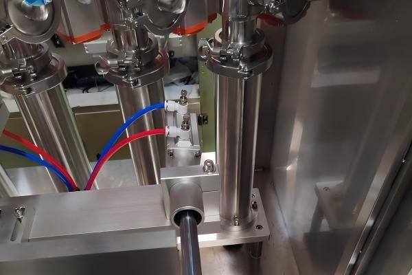 A quality control check showing perfectly filled bottles.